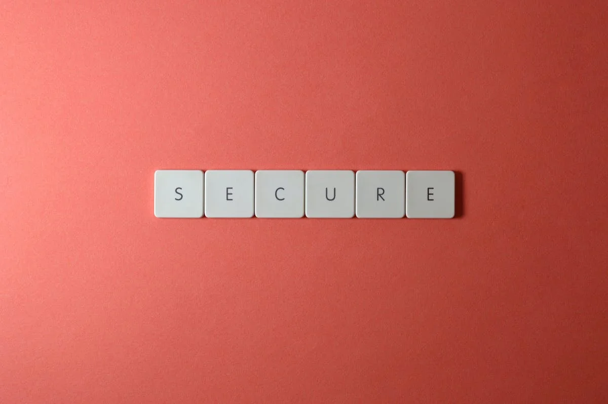 Tiles spelling SECURE on red background representing website security warning